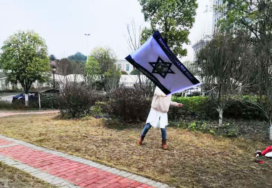 Woman waving UNIFY flag