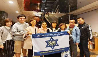 Group of people with UNIFY flag