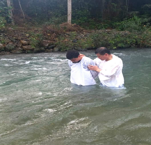 A man being baptised