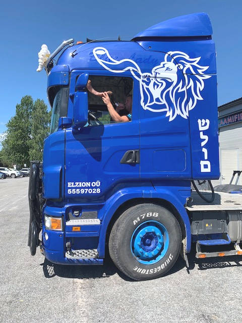 Truck driver blowing shofar