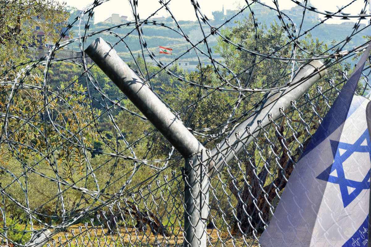 Barb wire fence with Israeli flag