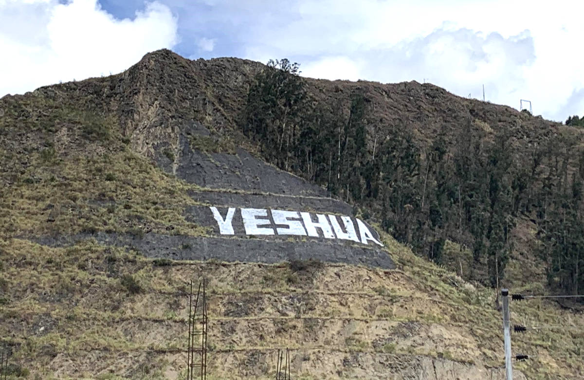 Yeshua name written on a mountain slope