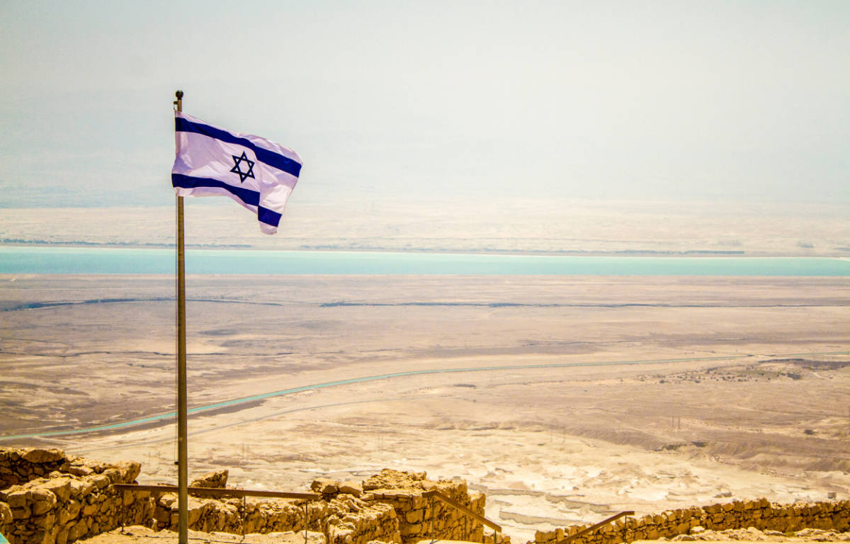 Israeli flag on the country border